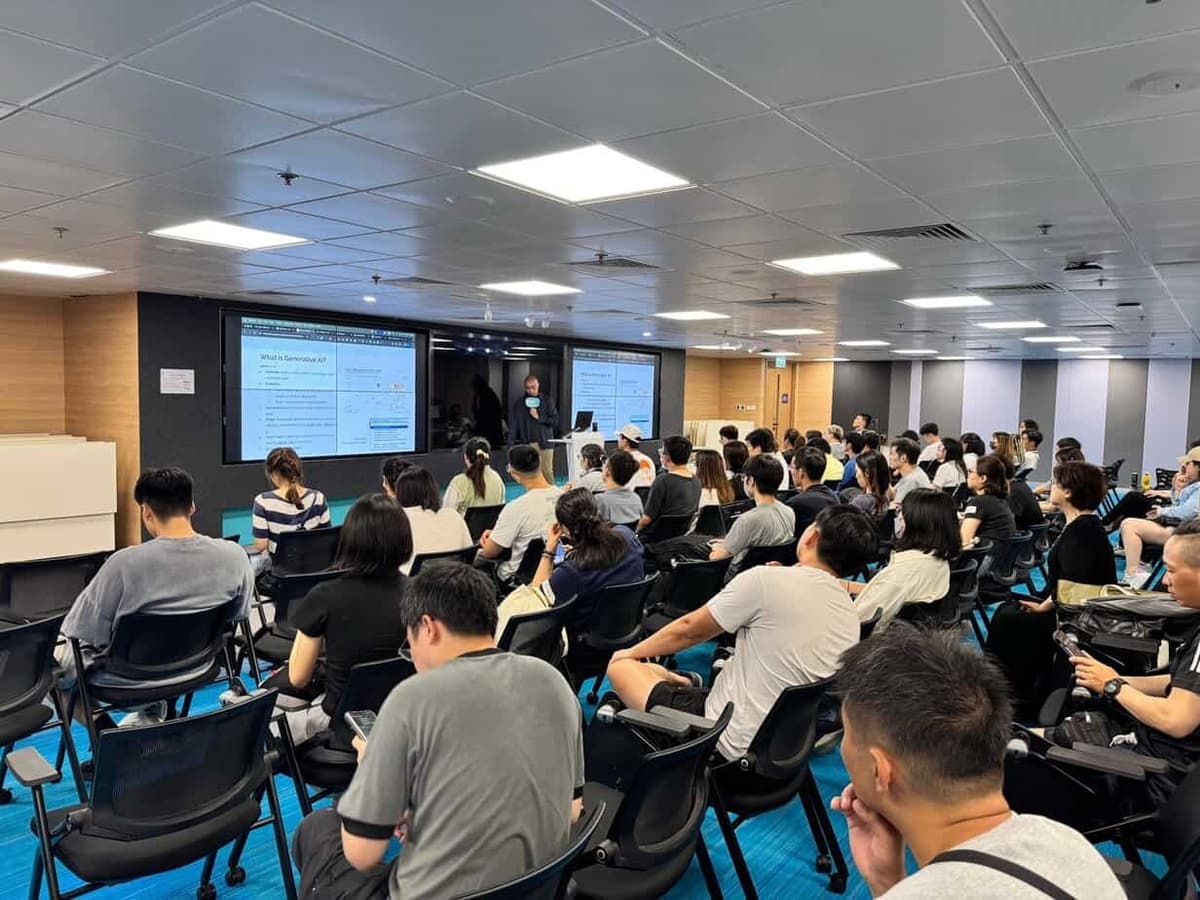 Ivan So teaching generative AI concepts to corporate audience